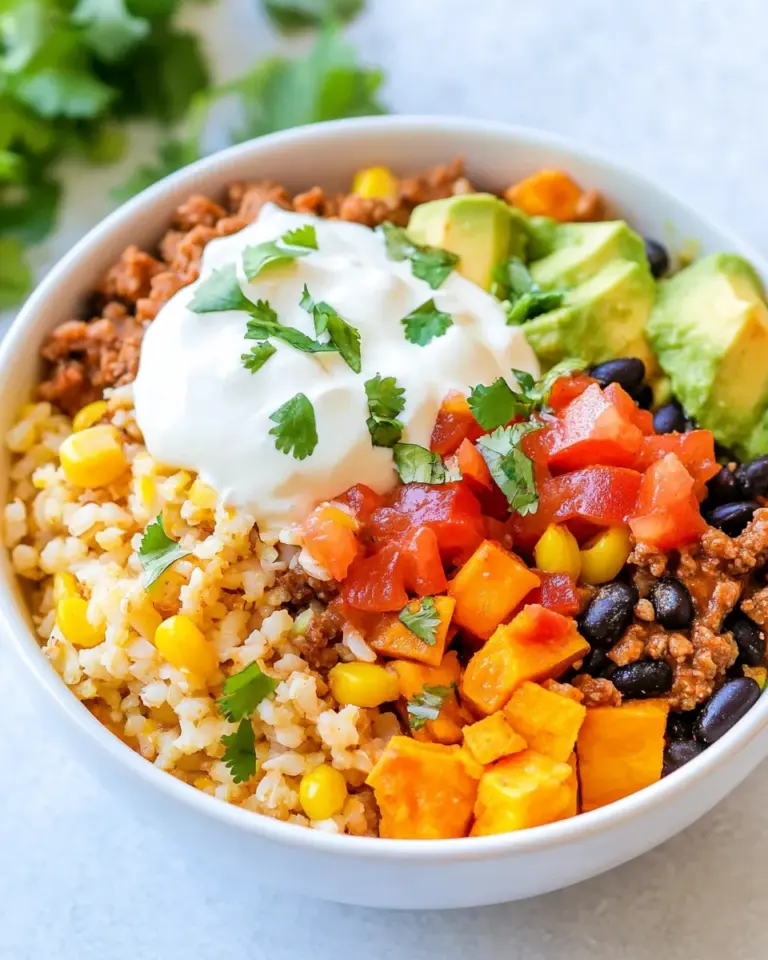 Homemade Riced Cauliflower and Sweet Potato Beef Burrito Bowls photo